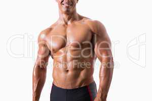 Smiling shirtless muscular man