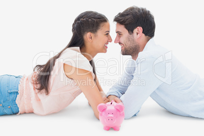 Attractive young couple smiling at each other