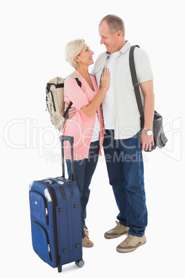 Smiling older couple going on their holidays