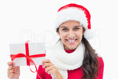 Beautiful festive woman holding gift