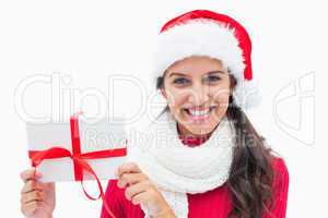 Beautiful festive woman holding gift
