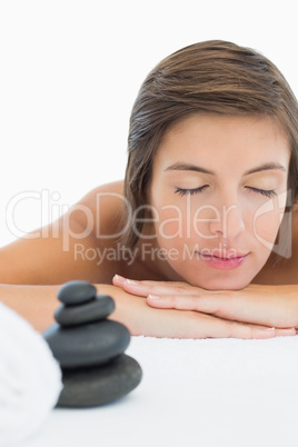 Close up of a beautiful young woman on massage table