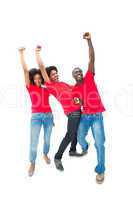 Excited football fans in red cheering