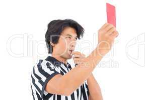 Stern referee showing red card