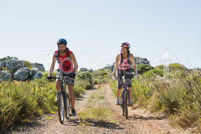 Active couple cycling in the countryside