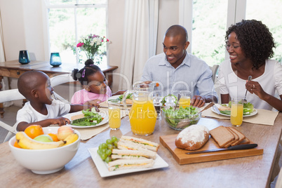 Happy family having lunch together