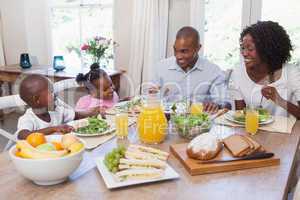 Happy family having lunch together