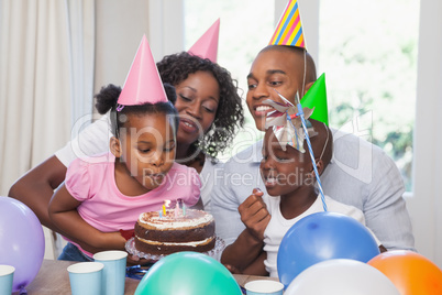 Happy family celebrating a birthday together