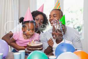 Happy family celebrating a birthday together