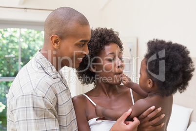 Happy couple with baby daughter