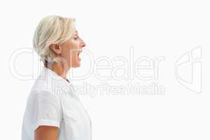 Happy mature woman talking loudly