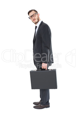 Geeky businessman holding his briefcase