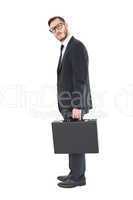 Geeky businessman holding his briefcase