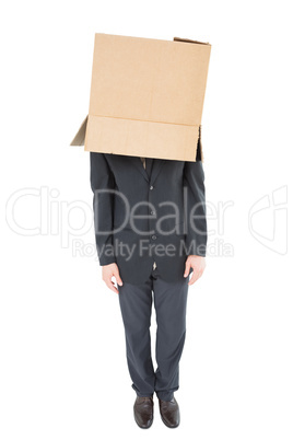 Businessman standing with box on head