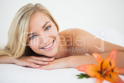 Beautiful blonde lying on massage table