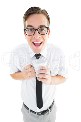 Geeky businessman holding a mug