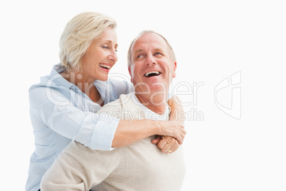 Happy mature couple smiling at each other