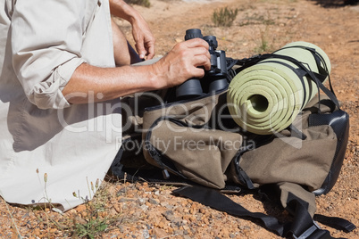 Hiker taking a break on country trail