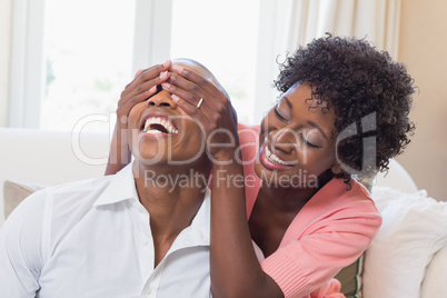 Happy couple relaxing on the couch