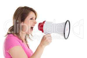 Close up side view of woman shouting into bullhorn