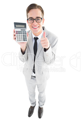 Geeky smiling businessman showing calculator