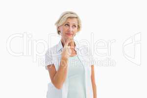 Mature woman thinking with hand on chin
