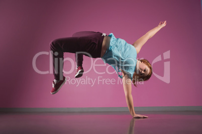 Pretty break dancer doing a handstand