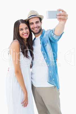 Happy hipster couple taking a selfie