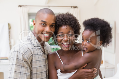 Happy couple with baby daughter