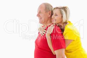 Happy mature couple hugging and smiling