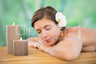 Beautiful young woman on massage tabl