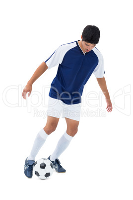 Football player kicking the ball Football player kicking the ball