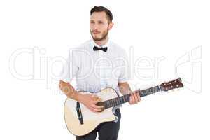 Geeky hipster playing the guitar