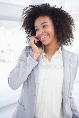 Casual businesswoman talking on phone