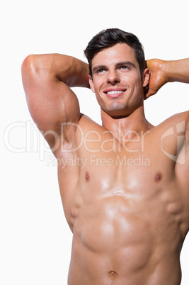 Smiling shirtless muscular man