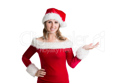 Pretty woman in santa costume presenting your product