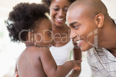 Happy parents with their baby girl