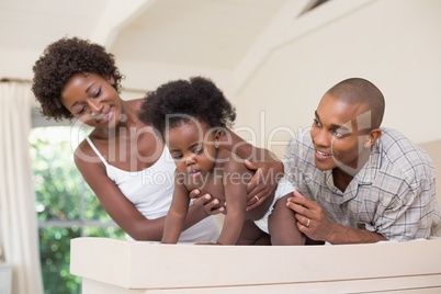 Happy parents with their baby girl Happy parents with their baby girl