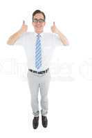 Geeky happy businessman showing thumbs up