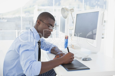 Focused businessman working at his desk