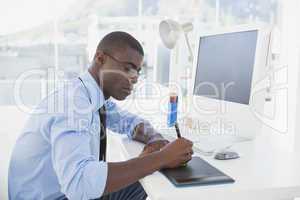 Focused businessman working at his desk