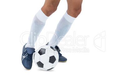 Football player kicking the ball