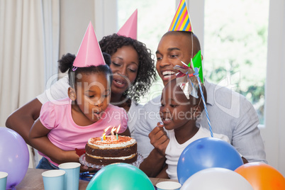 Happy family celebrating a birthday together