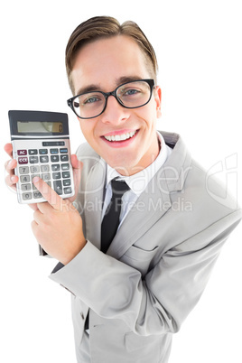 Geeky smiling businessman showing calculator