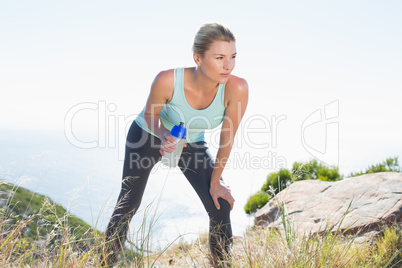 Fit blonde taking a break at summit