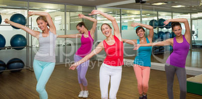 Zumba class dancing in studio