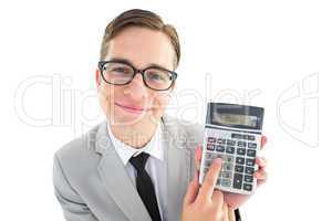 Geeky smiling businessman showing calculator