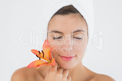 Close up of a beautiful woman holding flower