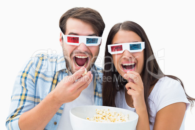 Attractive young couple watching a 3d movie