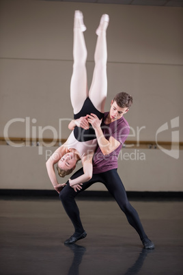Ballet partners dancing gracefully together